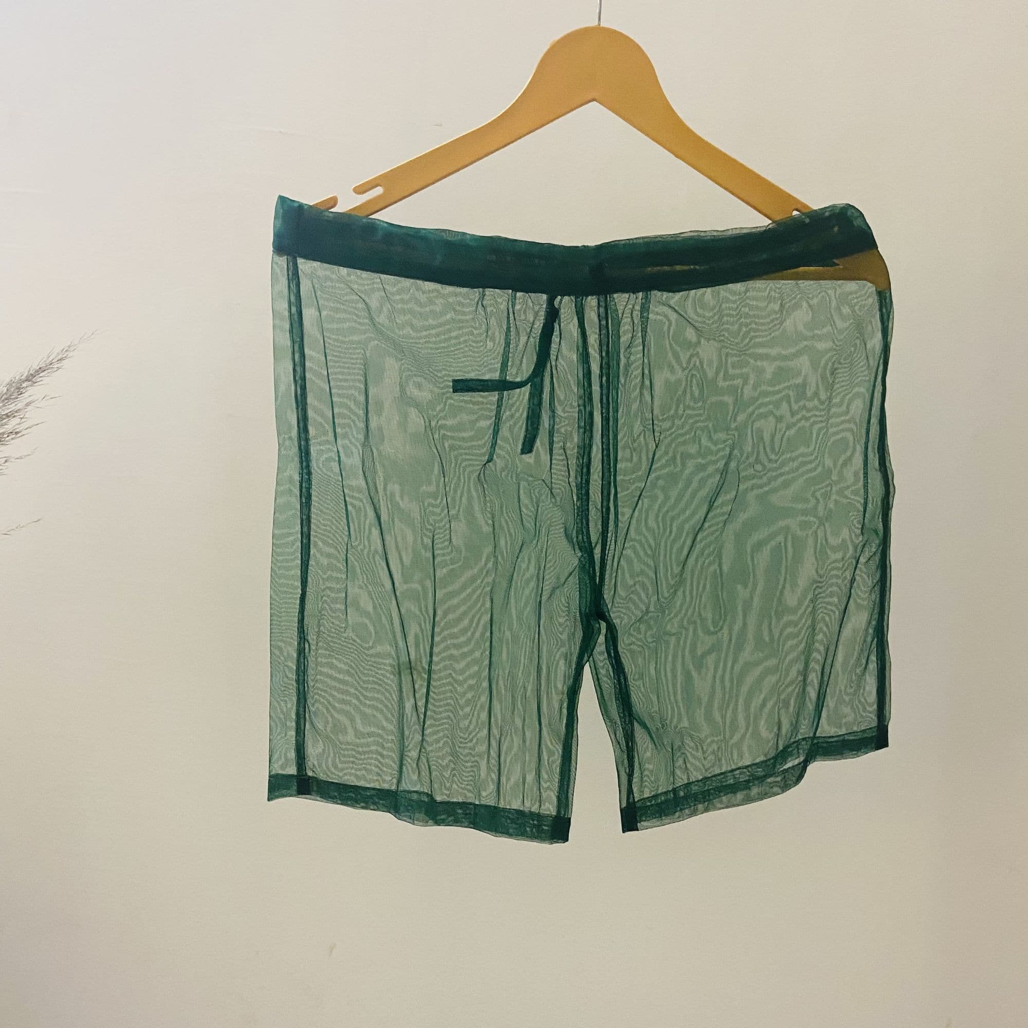 Green mesh party shorts